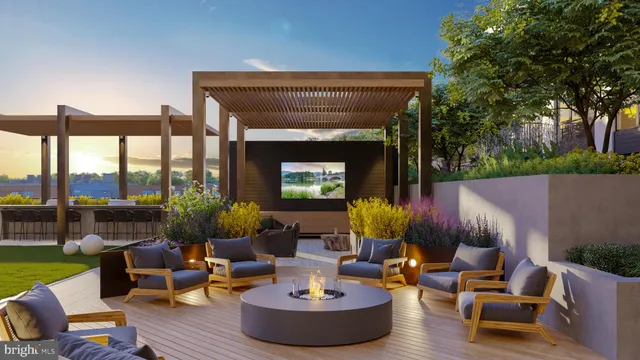 a building outdoor space with patio furniture and potted plants