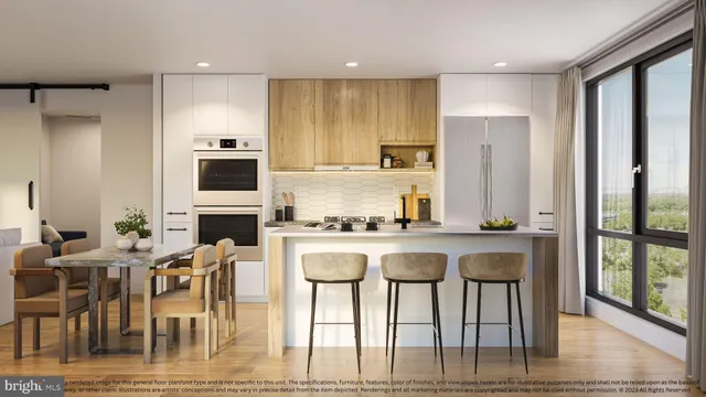 a kitchen with stainless steel appliances a stove top oven a sink a counter top space and cabinets