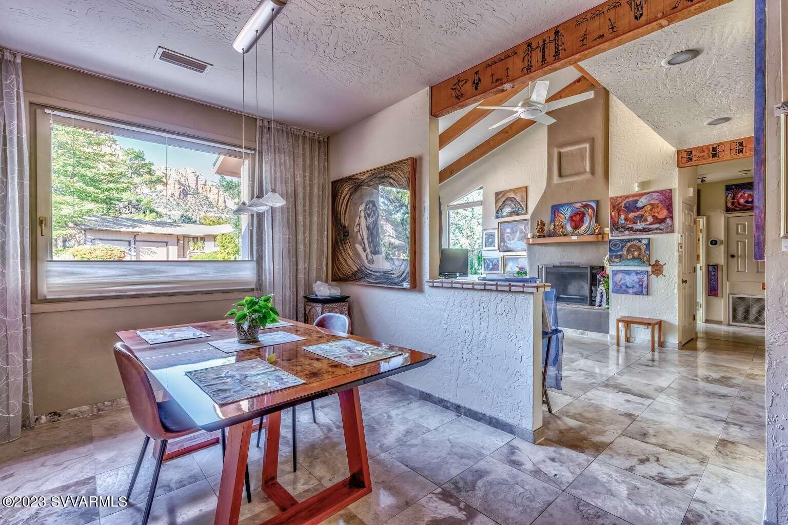 25 Homestead Road Sedona, AZ 86336 - Photo 14 of 25 a view of a dining room with furniture window and outside view