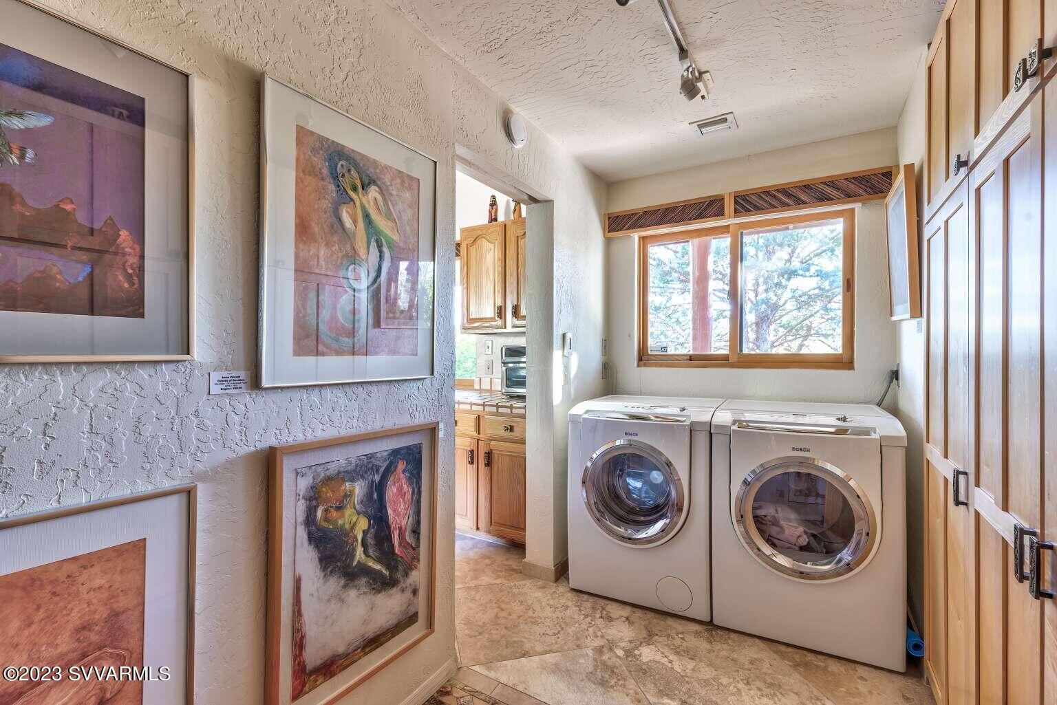 25 Homestead Road Sedona, AZ 86336 - Photo 17 of 25 a utility room with dryer and washer