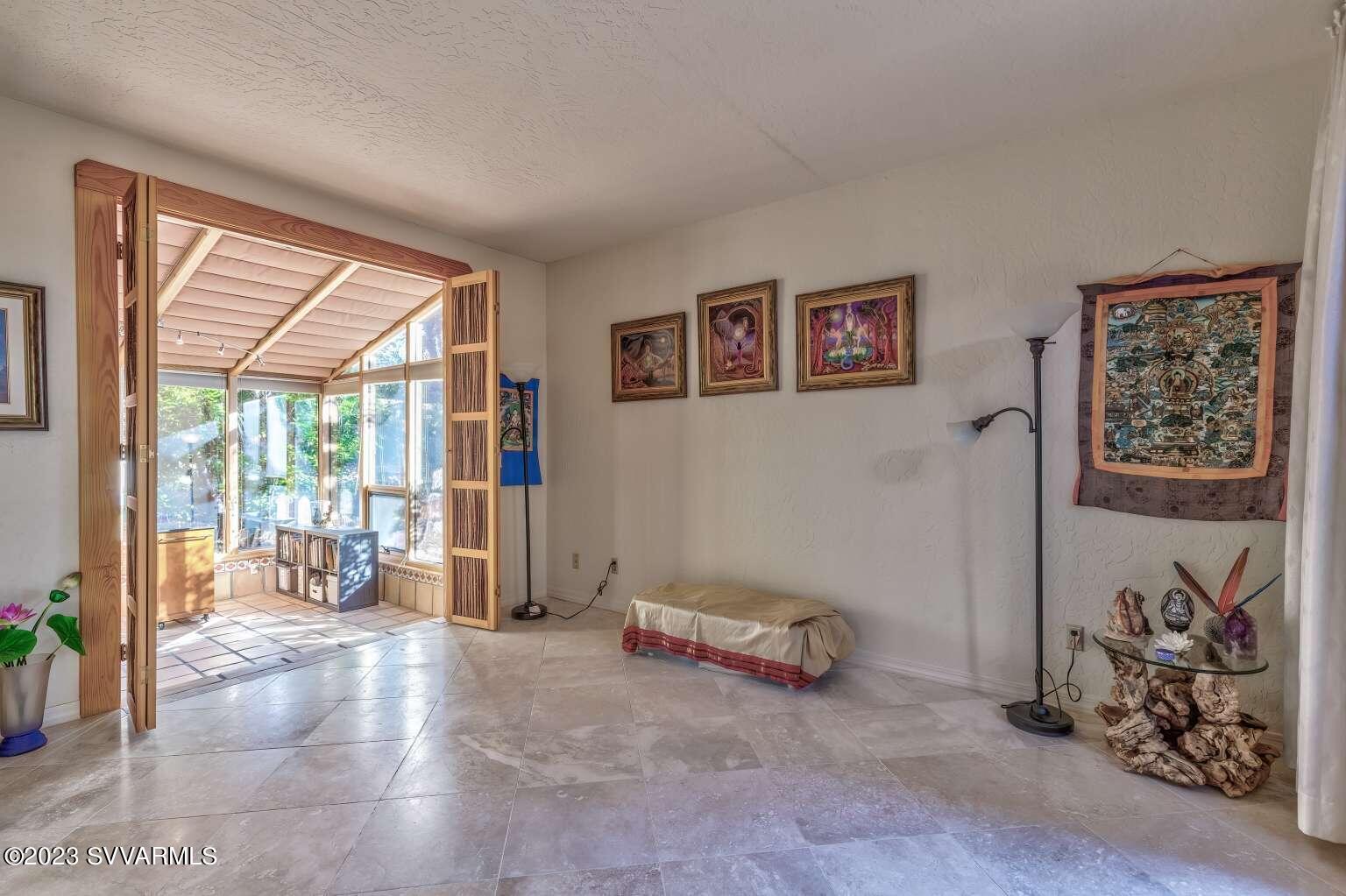 25 Homestead Road Sedona, AZ 86336 - Photo 20 of 25 a living room with furniture and a window