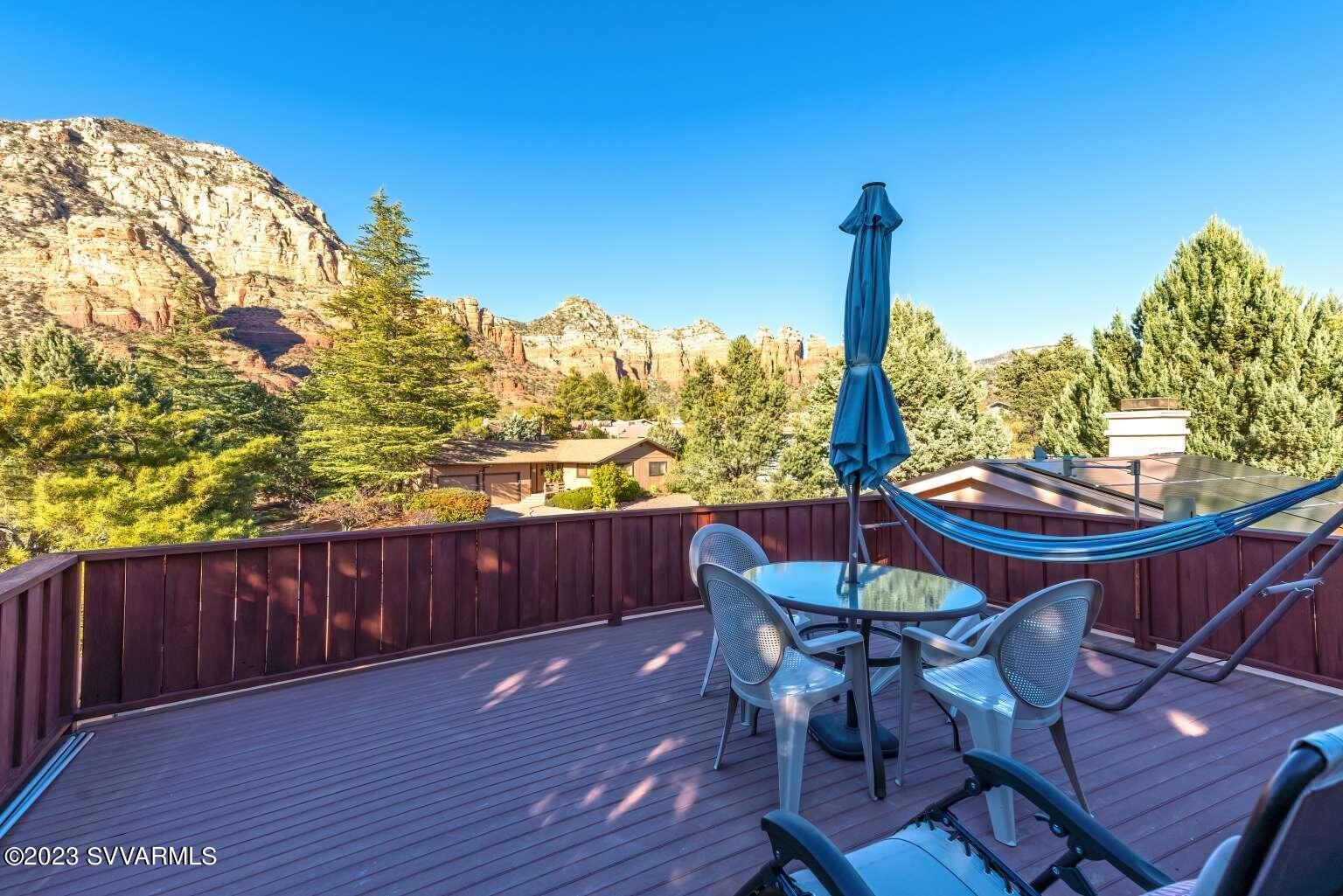 25 Homestead Road Sedona, AZ 86336 - Photo 6 of 25 a view of a chairs and table in the patio