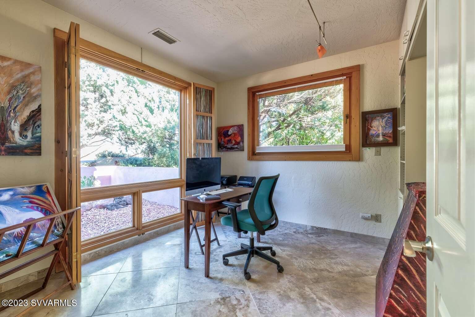 25 Homestead Road Sedona, AZ 86336 - Photo 9 of 25 a workspace with furniture and a window