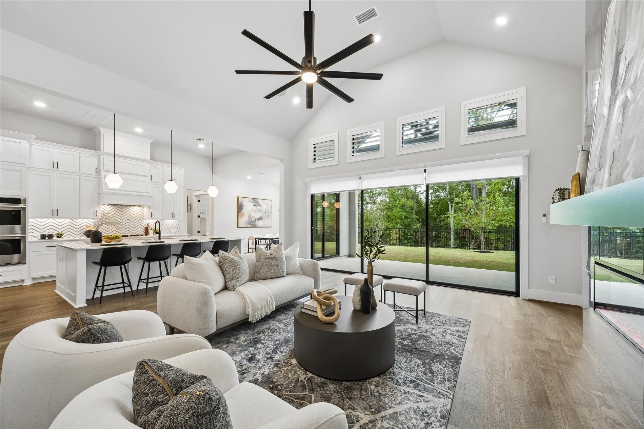 27720 Hazelbrook Lane Spring, TX 77386 - Photo 11 of 49 Another view of your Living Room looking out at the picturesque nature views. Your sliding glass doors lead to a 19'x11' (approx) Covered Patio with upgraded ceiling fan