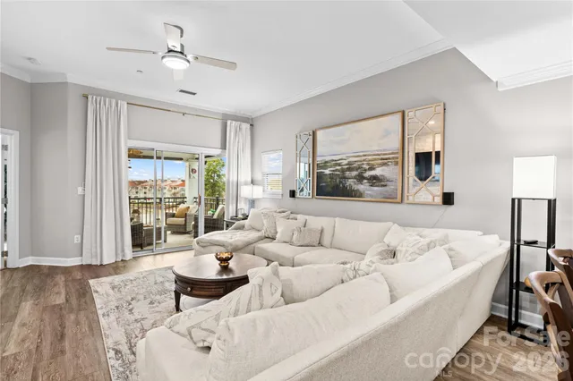 an aerial view of a house with a lake view