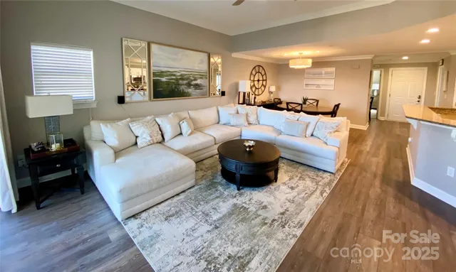 a large bedroom with a large bed and a large window