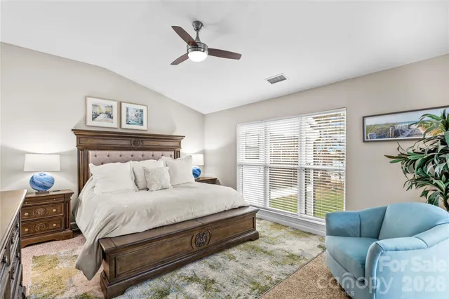 a view of a swimming pool with a garden