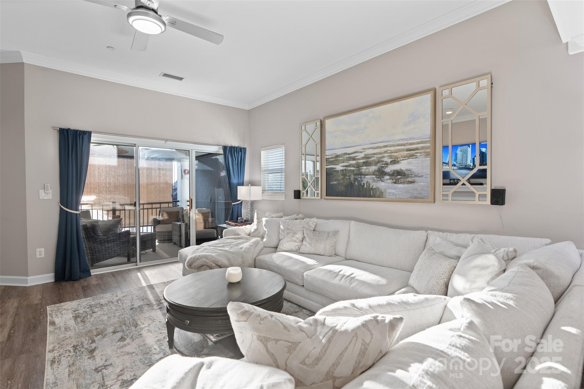 17810 Half Moon Lane, Unit L Cornelius, NC 28031 - Photo 17 of 48 a living room with furniture and a large window