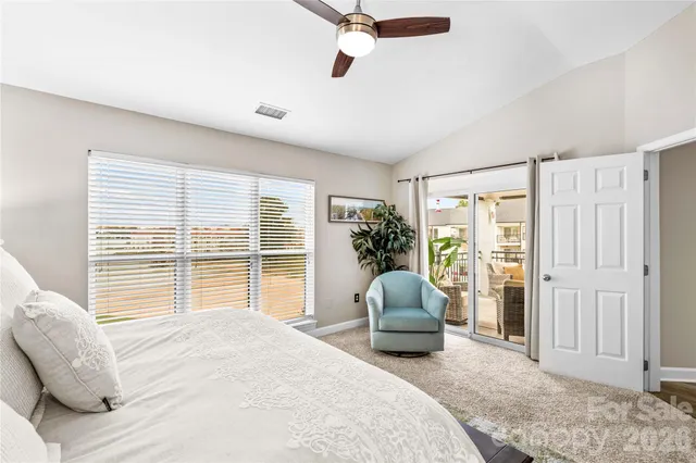 a view of a living room and dining room
