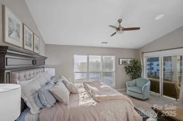 a bedroom with furniture and a window