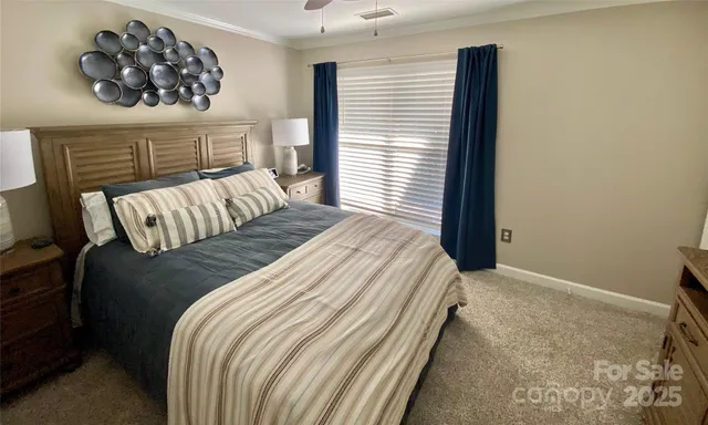 a bathroom with a sink mirror and shower