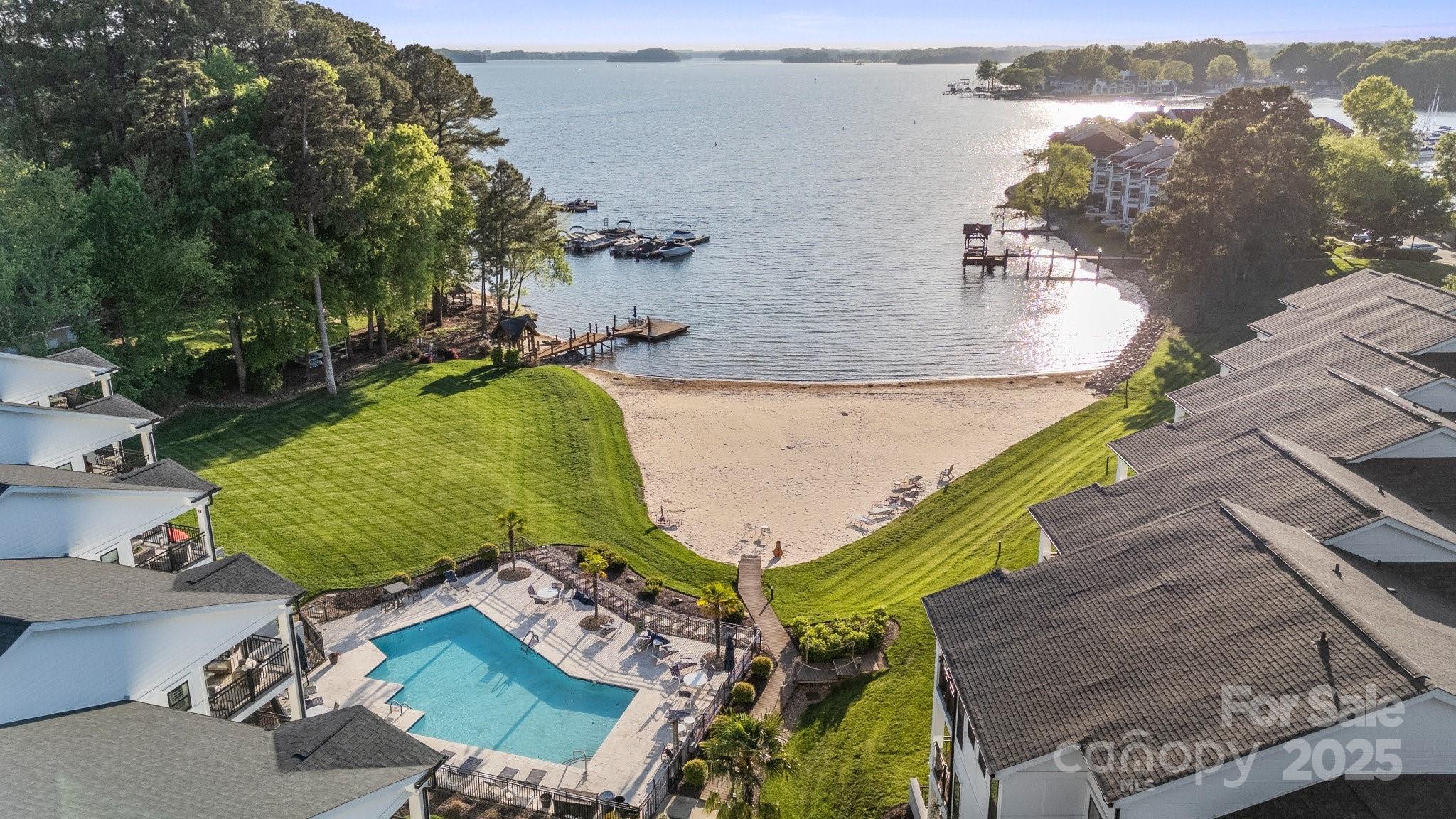 17810 Half Moon Lane, Unit L Cornelius, NC 28031 - Photo 33 of 48 an aerial view of a house with a yard and lake view