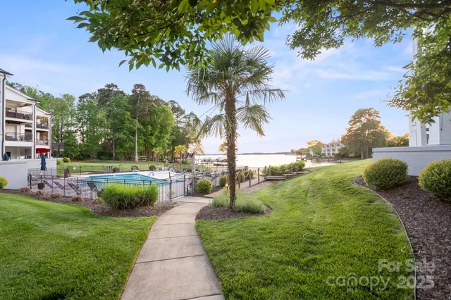 a view of a swimming pool with a garden