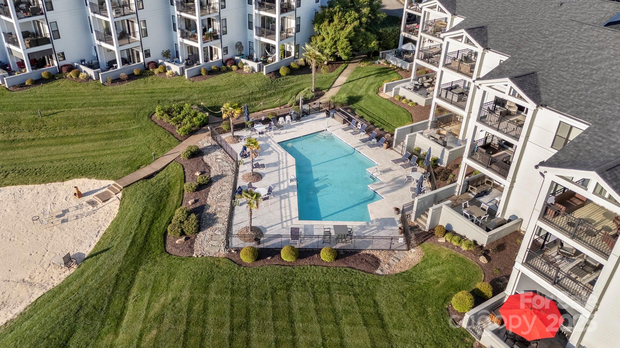 17810 Half Moon Lane, Unit L Cornelius, NC 28031 - Photo 6 of 48 an aerial view of a house with outdoor space tennis court