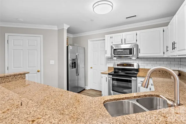 a bathroom with a shower and a shower