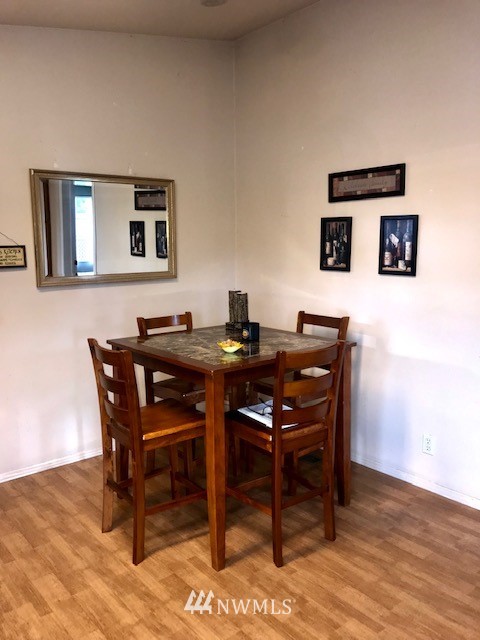 18937 Guava Street Southwest Rochester, WA 98579 - Photo 9 of 25 a table and chairs in a room