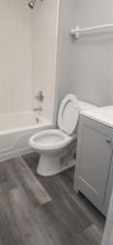 8020 North Colony Circle, Unit 110 Tamarac, FL 33321 - Photo 5 of 11 a bathroom with a toilet and a bathtub
