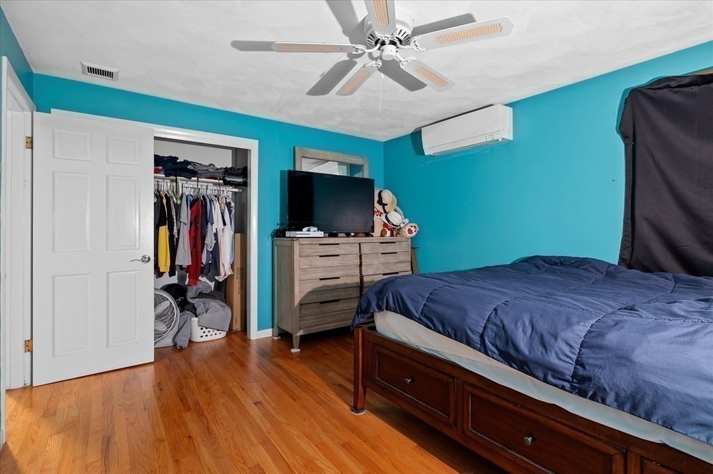 6 Nancy Drive Auburn, MA 01501 - Photo 15 of 27 a bedroom with furniture and a flat screen tv