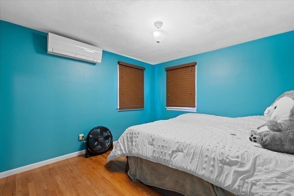 6 Nancy Drive Auburn, MA 01501 - Photo 16 of 27 a bedroom with a bed and a window