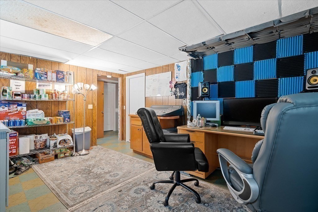6 Nancy Drive Auburn, MA 01501 - Photo 21 of 27 a work room with furniture and a floor to ceiling window
