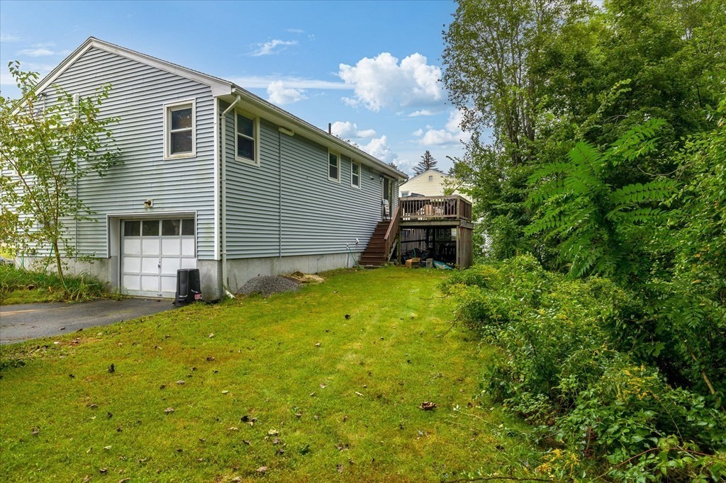 6 Nancy Drive Auburn, MA 01501 - Photo 4 of 27 a view of a house with a backyard