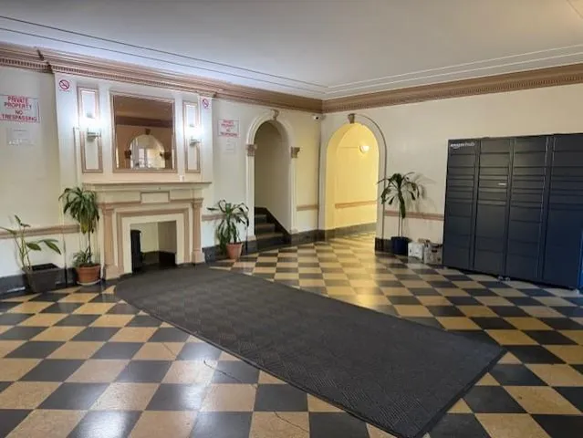 a view of a living room and a fireplace