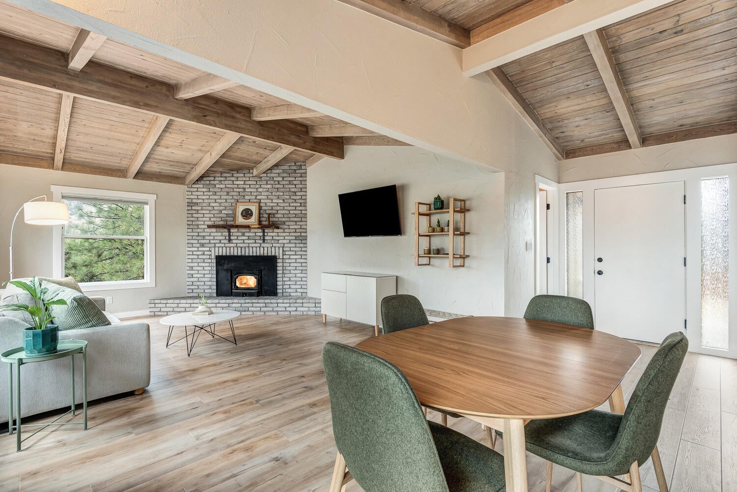 1363 Northeast Bear Creek Road Bend, OR 97702 - Photo 4 of 25 Open living space with fireplace