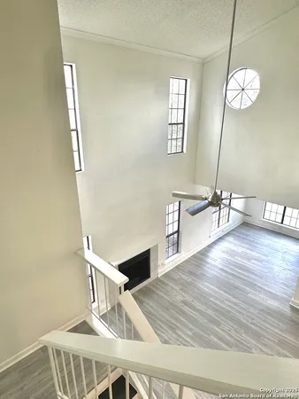 a view of livingroom and dining room with wooden floor