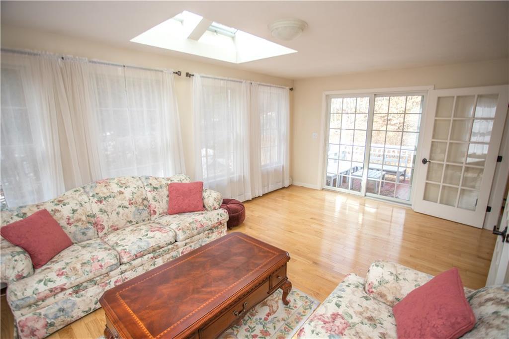30 Rogers Way Alfred, ME 04002 - Photo 5 of 20 This living area gets plenty of...