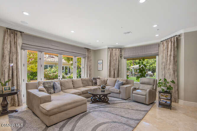 421 Whitegate Road Newbury Park, CA 91320 - Photo 27 of 76 a living room with furniture and a large window