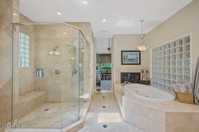 421 Whitegate Road Newbury Park, CA 91320 - Photo 43 of 76 a bathroom with a bathtub shower sink and mirror