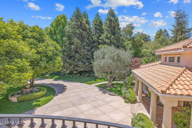 421 Whitegate Road Newbury Park, CA 91320 - Photo 48 of 76 a view of house with a yard and potted plants