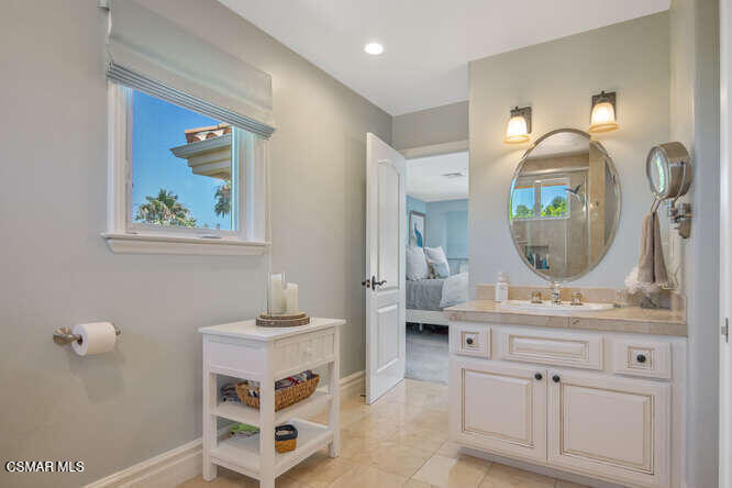 421 Whitegate Road Newbury Park, CA 91320 - Photo 49 of 76 a bathroom with a sink mirror and view