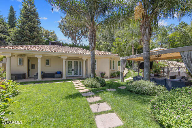 421 Whitegate Road Newbury Park, CA 91320 - Photo 69 of 76 a view of a house with a yard