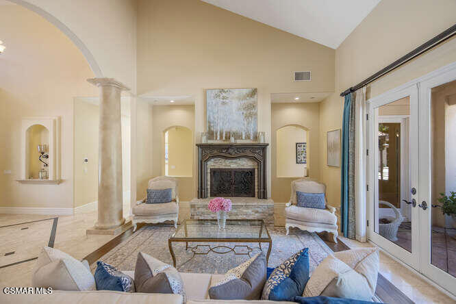 421 Whitegate Road Newbury Park, CA 91320 - Photo 7 of 76 a living room with furniture and a fireplace