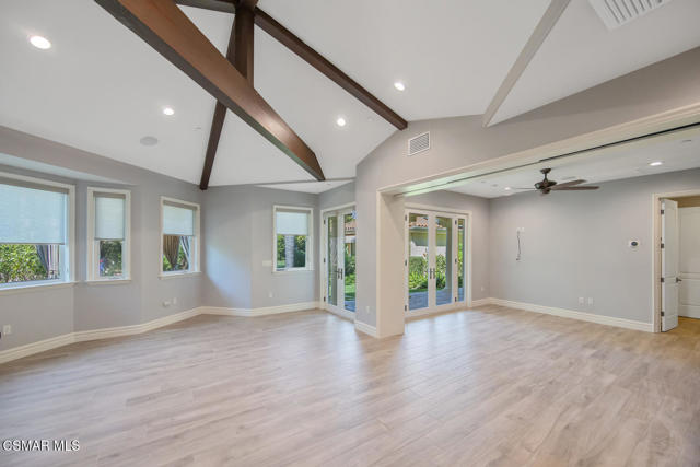 421 Whitegate Road Newbury Park, CA 91320 - Photo 74 of 76 an empty room with wooden floor and windows