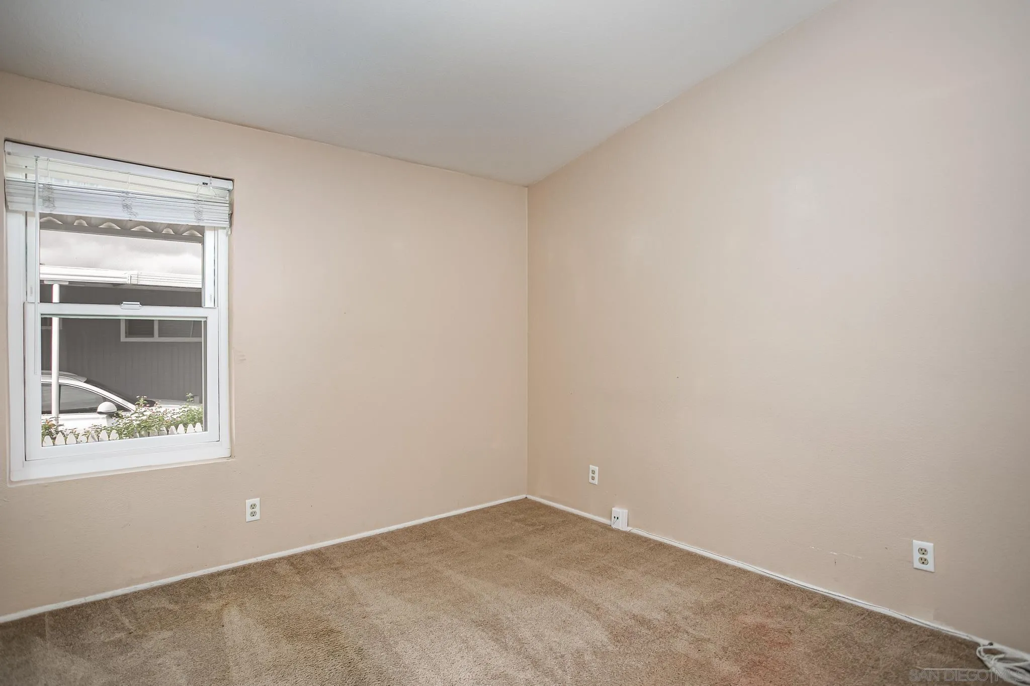 11949 Riverside Drive, Unit SPC 186 Lakeside, CA 92040 - Photo 15 of 40 an empty room with a window