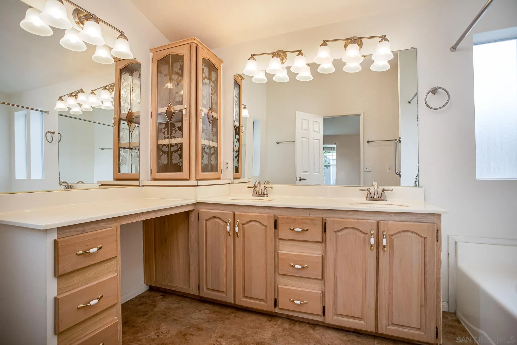 11949 Riverside Drive, Unit SPC 186 Lakeside, CA 92040 - Photo 18 of 40 a spacious bathroom with a granite countertop sink a large mirror and a