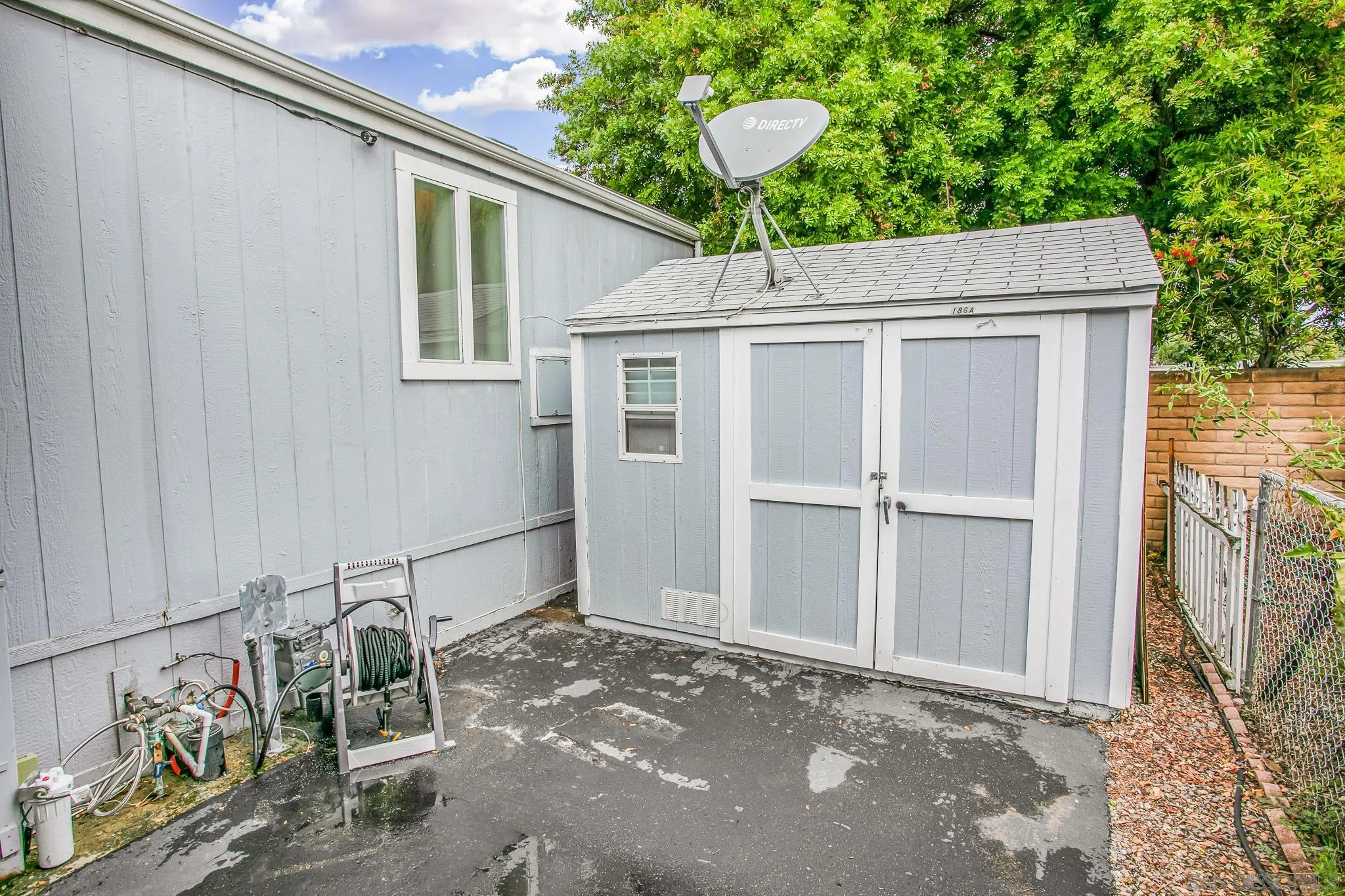 11949 Riverside Drive, Unit SPC 186 Lakeside, CA 92040 - Photo 24 of 40 a backyard of a house with seating space