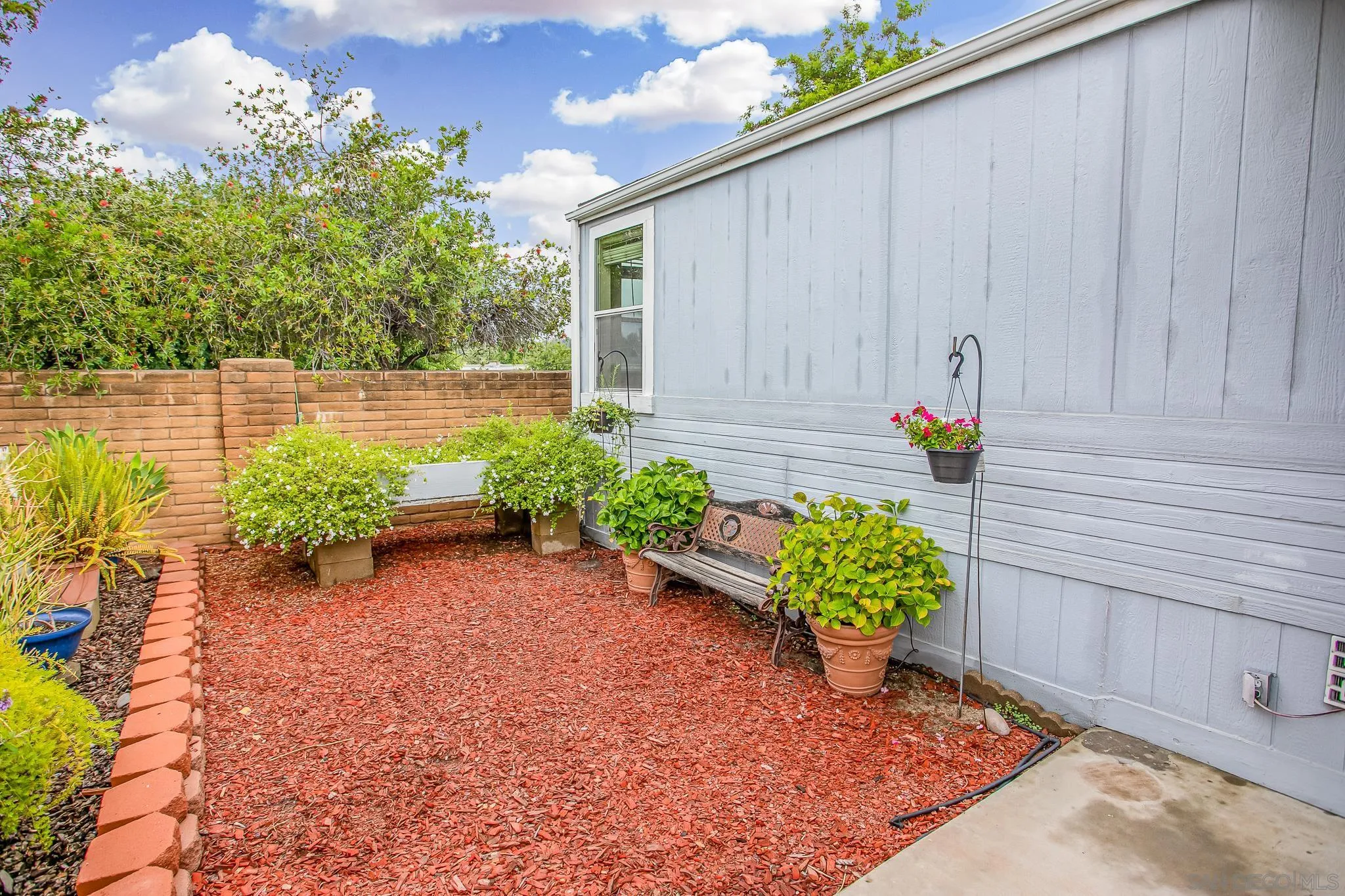 11949 Riverside Drive, Unit SPC 186 Lakeside, CA 92040 - Photo 26 of 40 a view of a back yard of the house