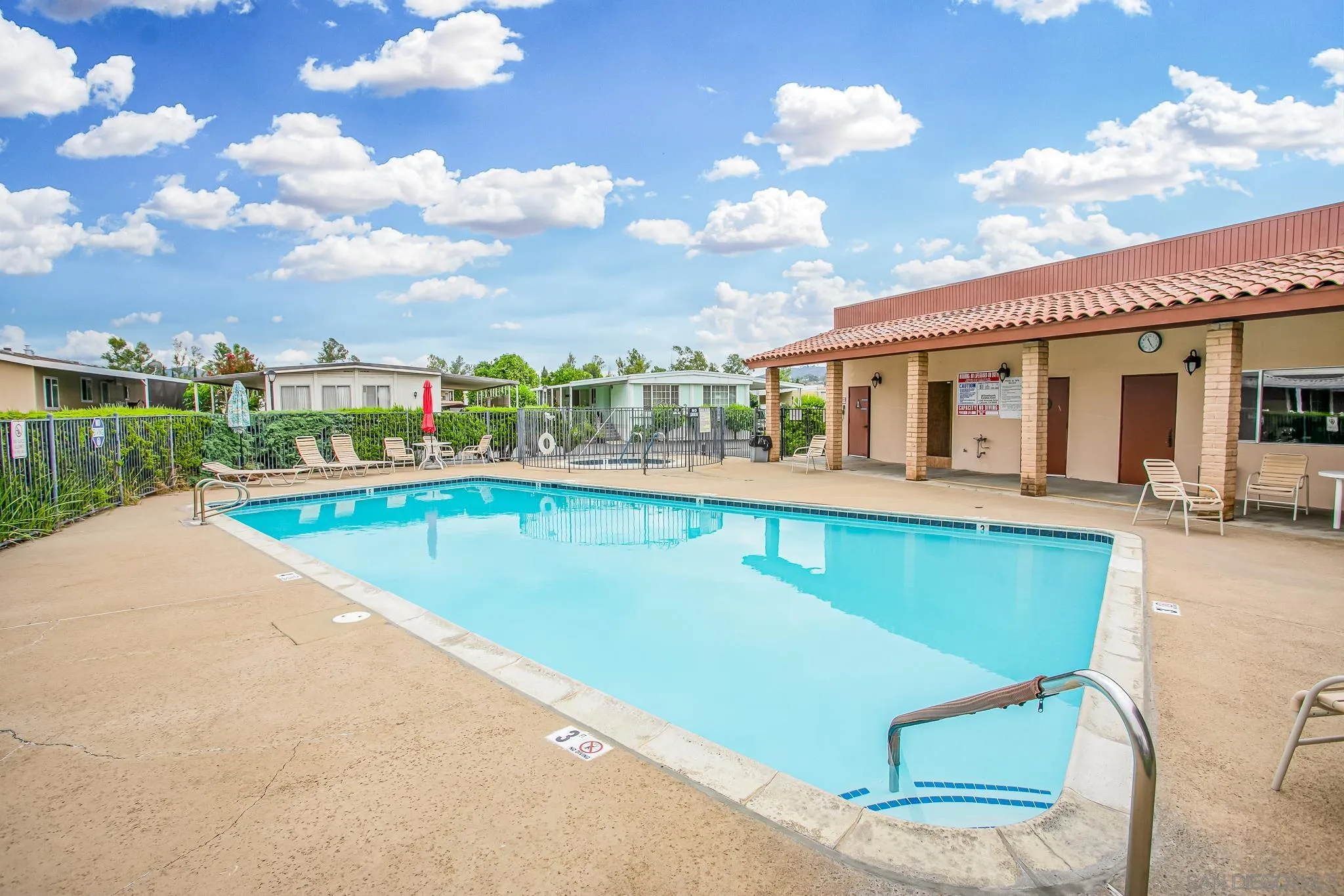 11949 Riverside Drive, Unit SPC 186 Lakeside, CA 92040 - Photo 28 of 40 a view of a patio with swimming pool