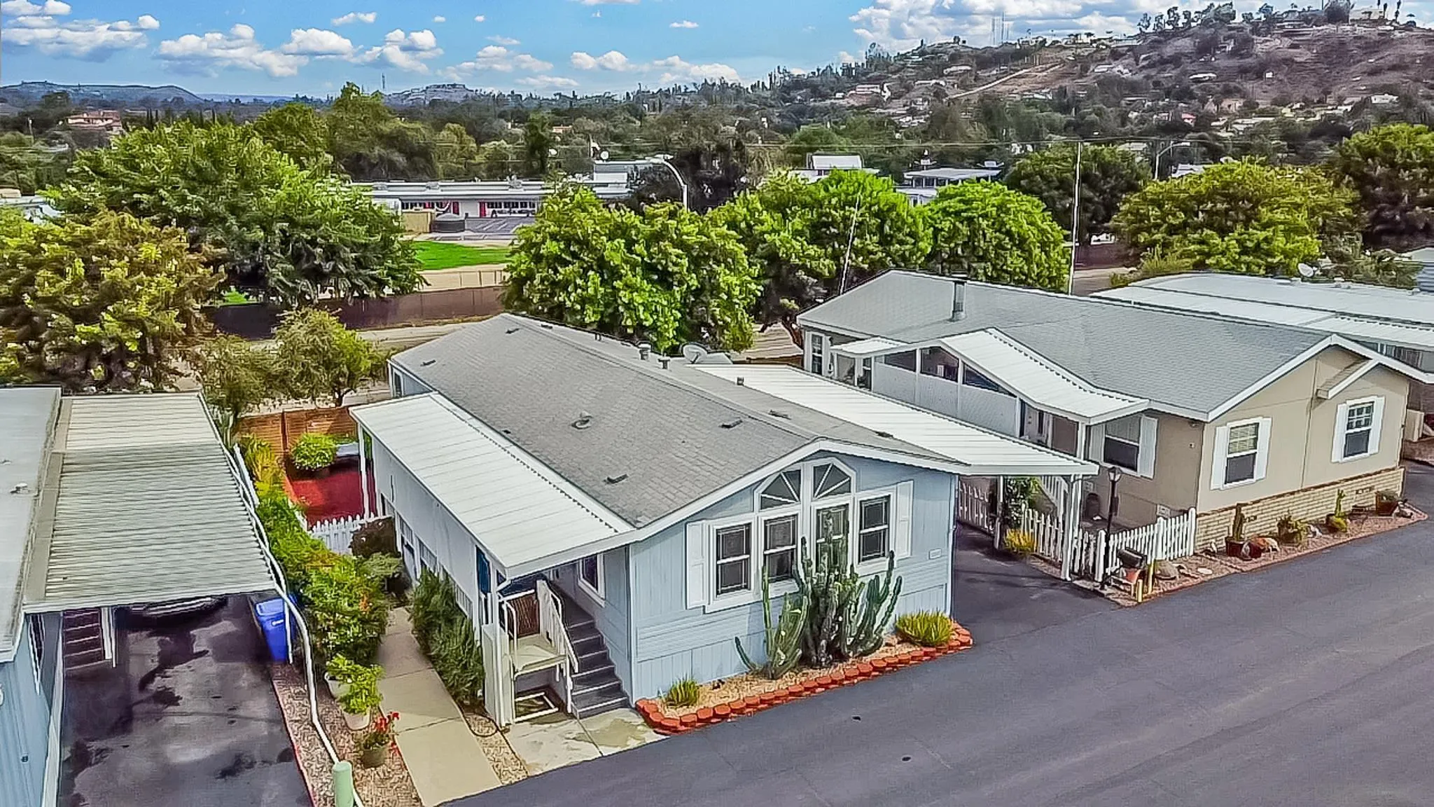 11949 Riverside Drive, Unit SPC 186 Lakeside, CA 92040 - Photo 33 of 40 an aerial view of a house with a yard patio and outdoor seating