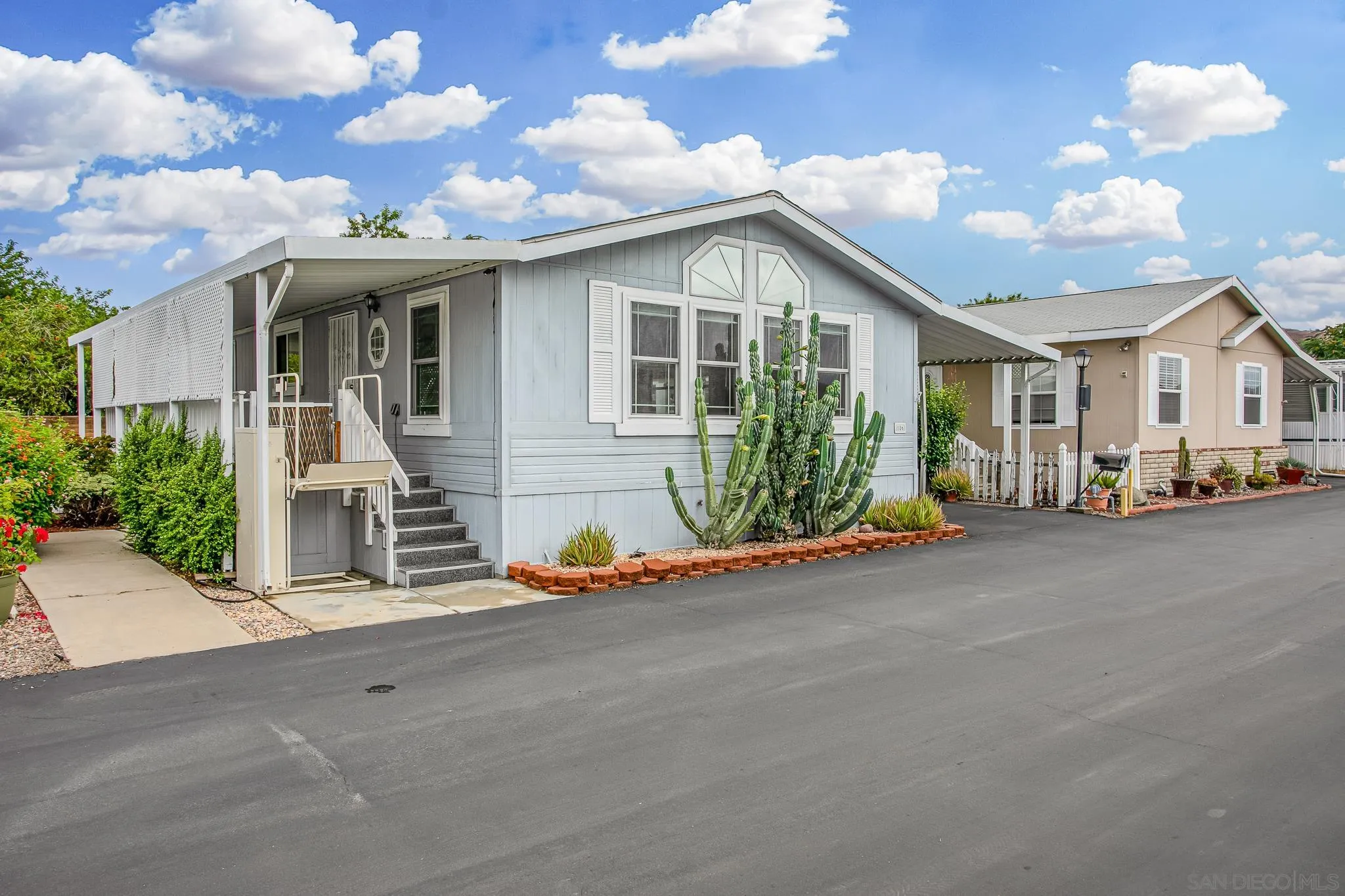 11949 Riverside Drive, Unit SPC 186 Lakeside, CA 92040 - Photo 4 of 40 a view of a house with backyard and garden