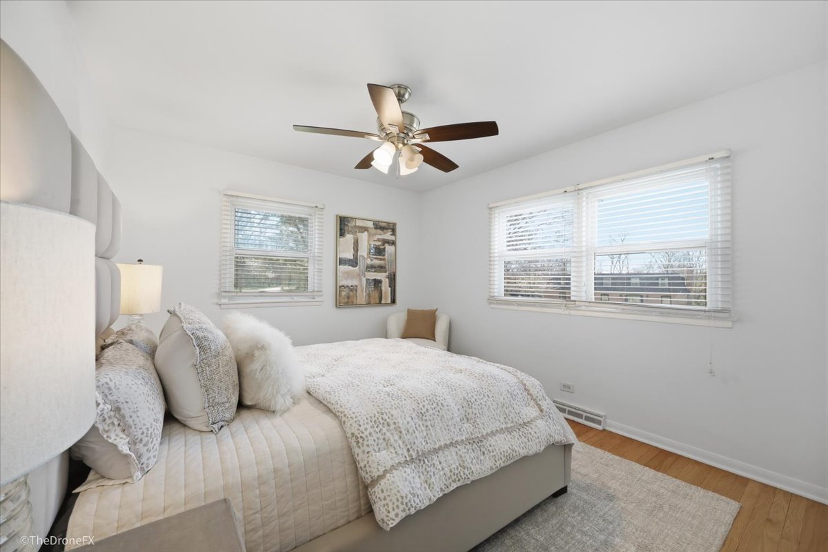 1519 Foothill Drive Wheaton, IL 60189 - Photo 21 of 44 a bedroom with a large bed and a window