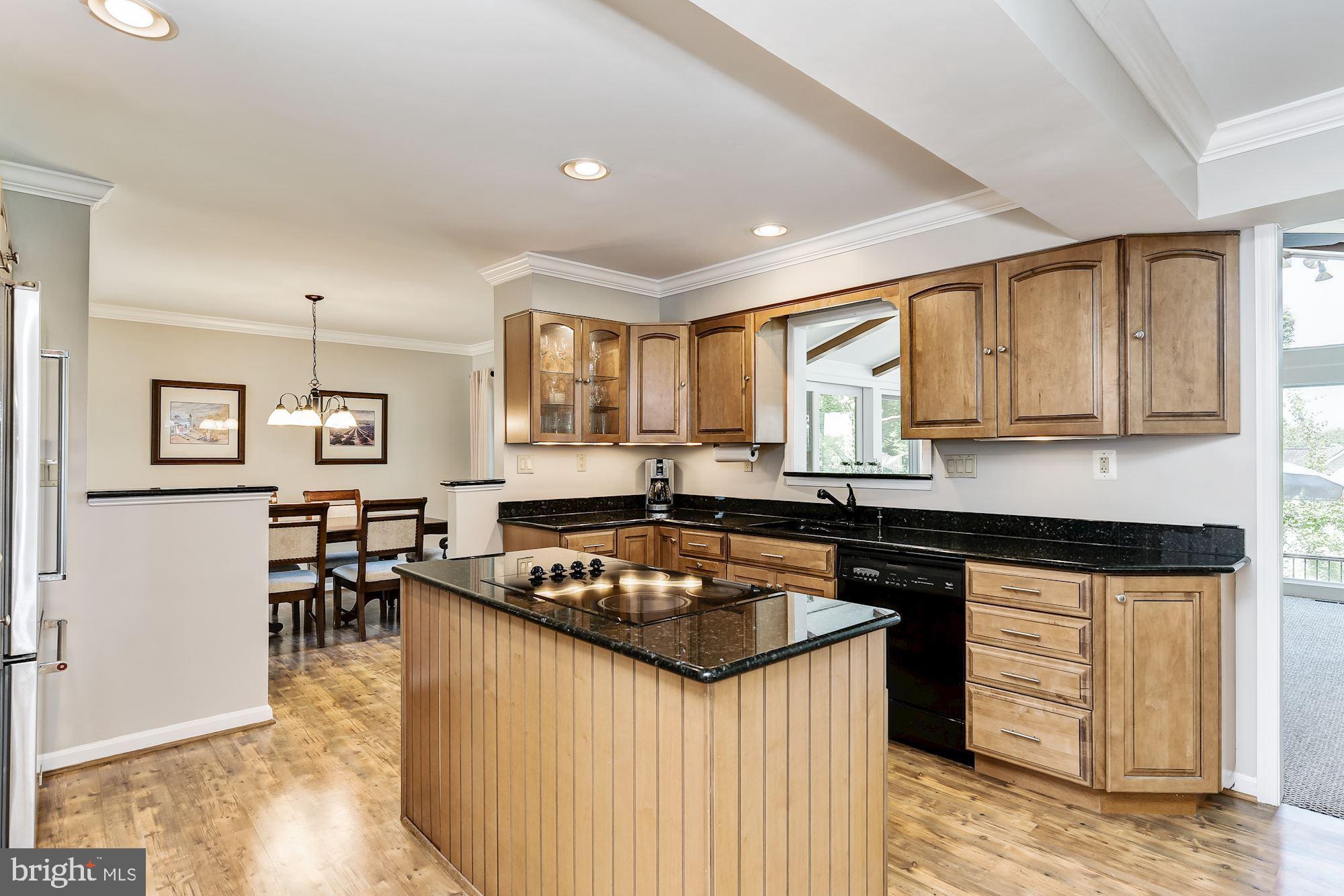3069 Riverview Road Riva, MD 21140 - Photo 11 of 38 a kitchen with granite countertop a sink stove and cabinets