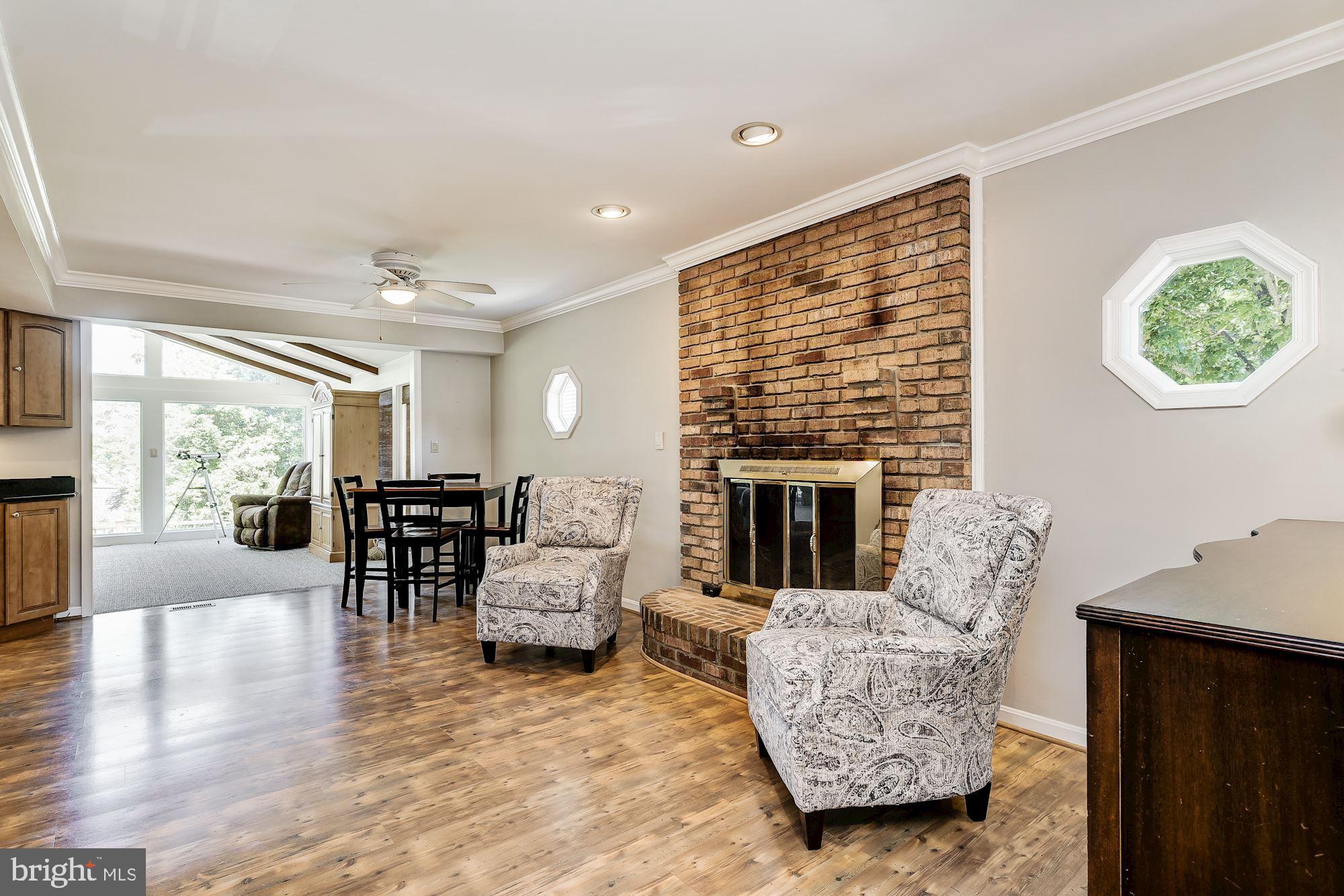 3069 Riverview Road Riva, MD 21140 - Photo 13 of 38 a living room with furniture and a fireplace