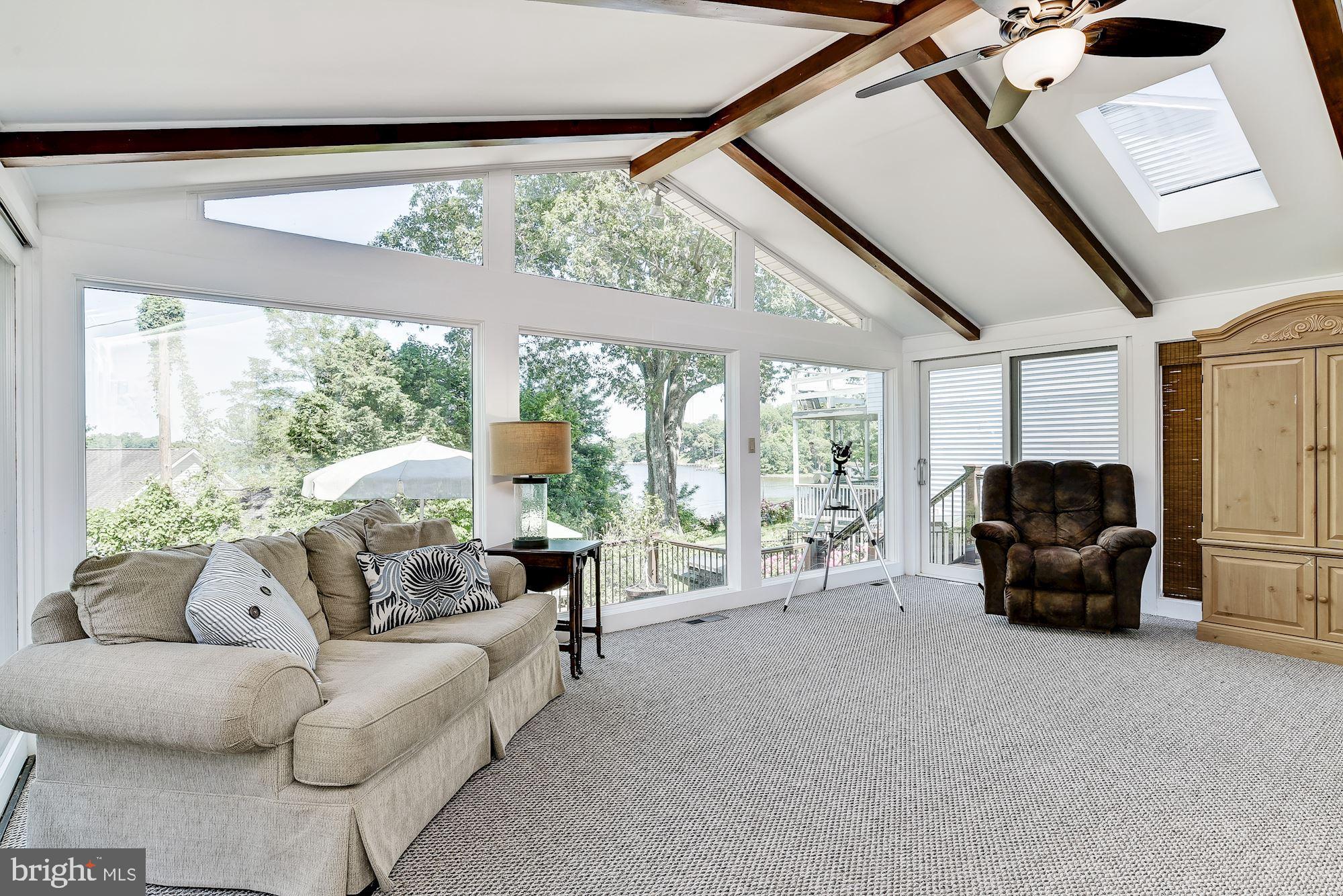 3069 Riverview Road Riva, MD 21140 - Photo 16 of 38 a living room with furniture and a large window