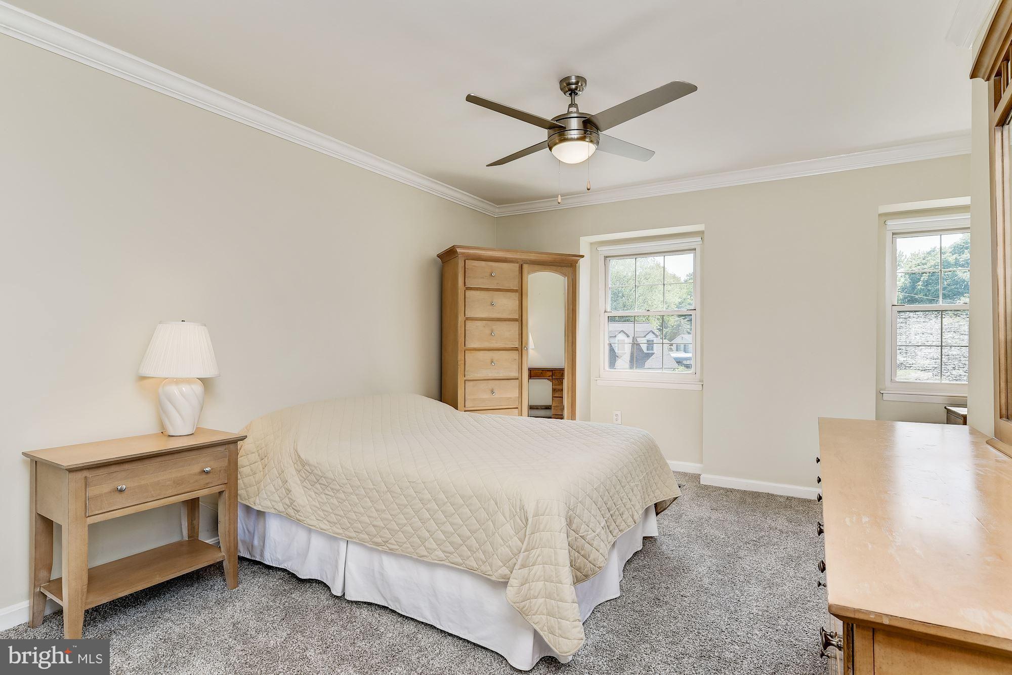 3069 Riverview Road Riva, MD 21140 - Photo 25 of 38 a bedroom with a bed and a window