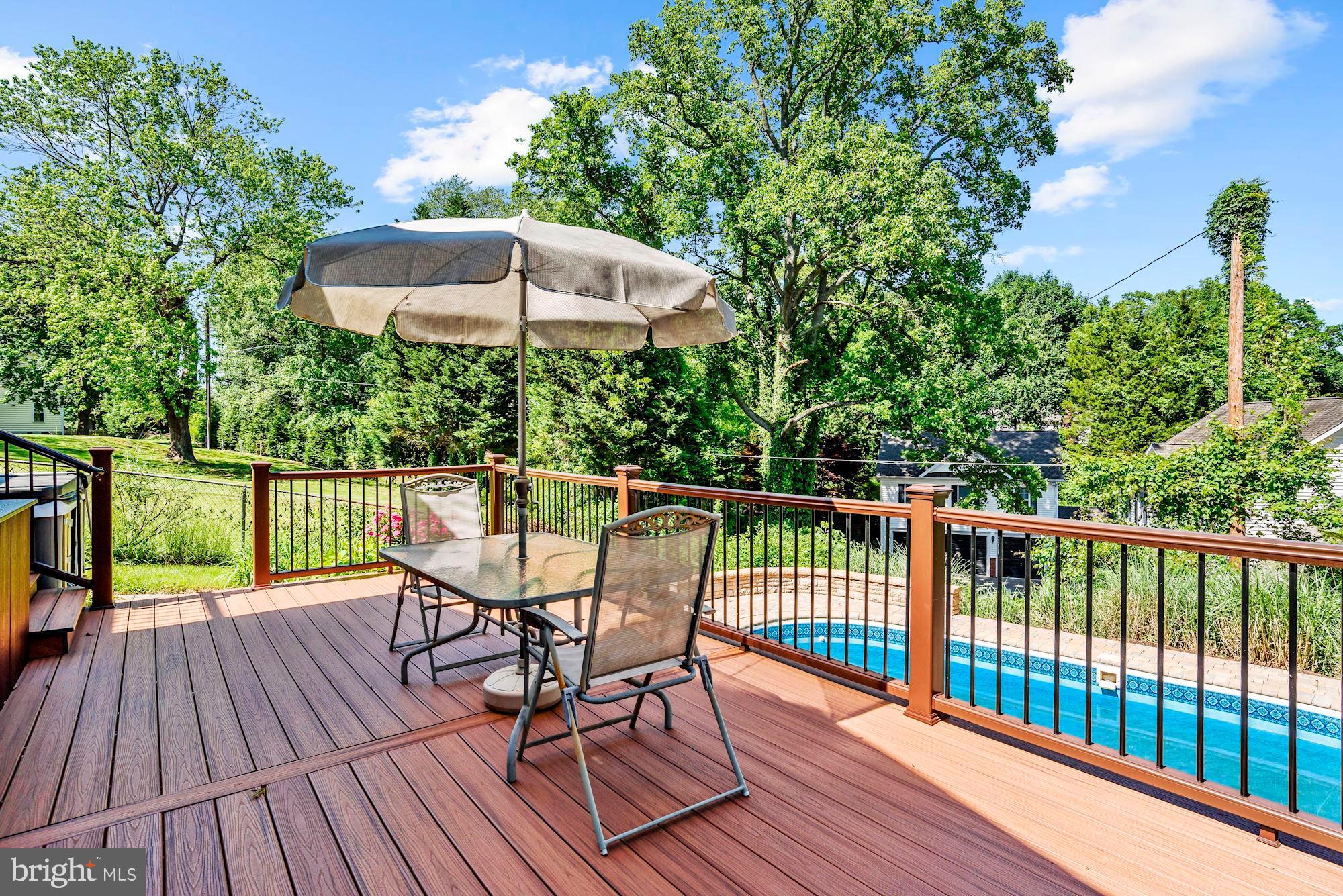 3069 Riverview Road Riva, MD 21140 - Photo 30 of 38 a view of a chair and table on the wooden deck