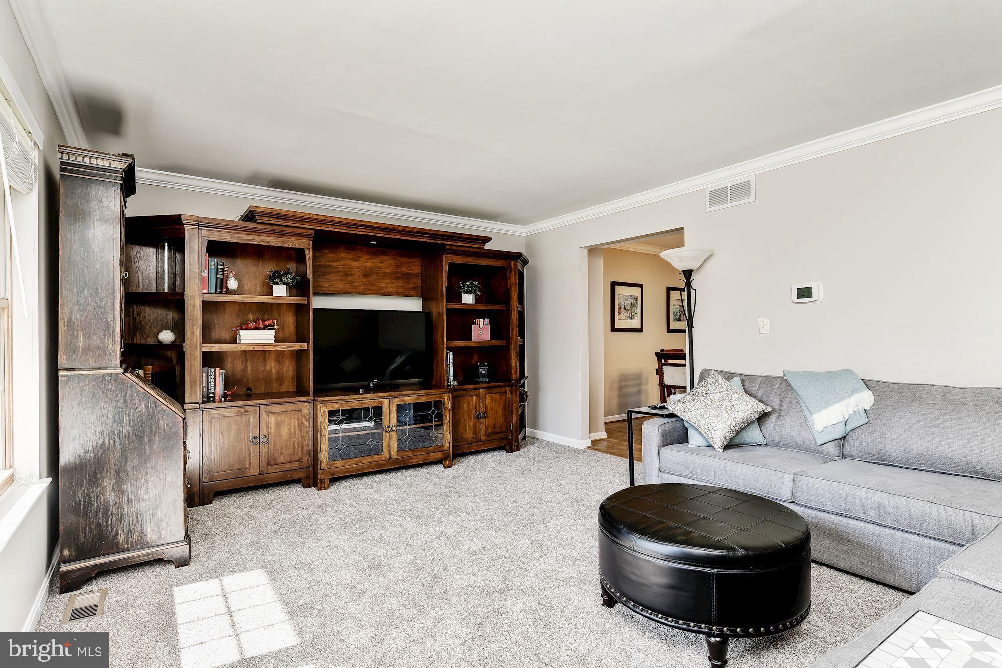 3069 Riverview Road Riva, MD 21140 - Photo 6 of 38 a living room with furniture and a flat screen tv